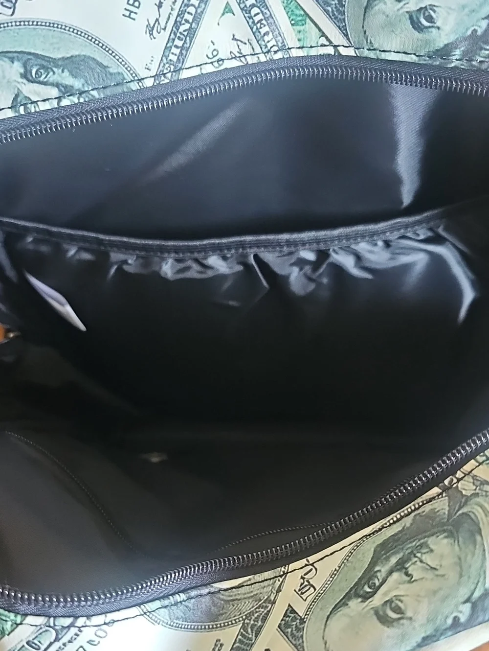 Reason Cash-Print Backpack in Green and Black with Pink Accent